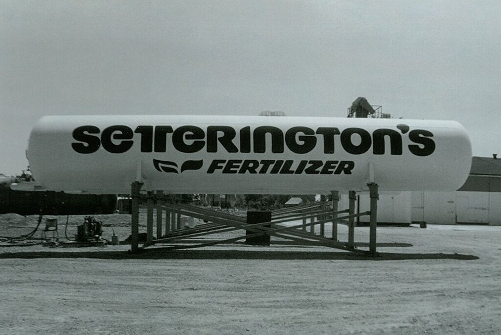 Old Setterington's Fertilizer silo in black and white