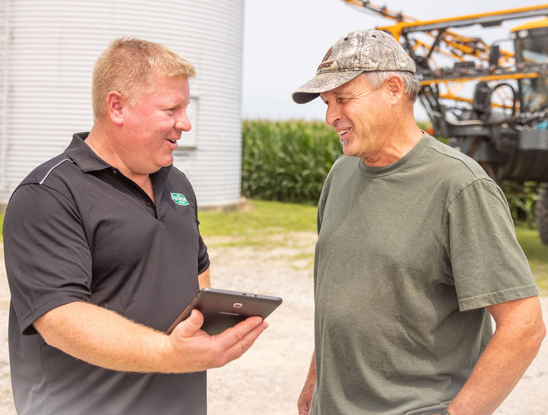 Setterington's employee talking to customer at Setterington's location