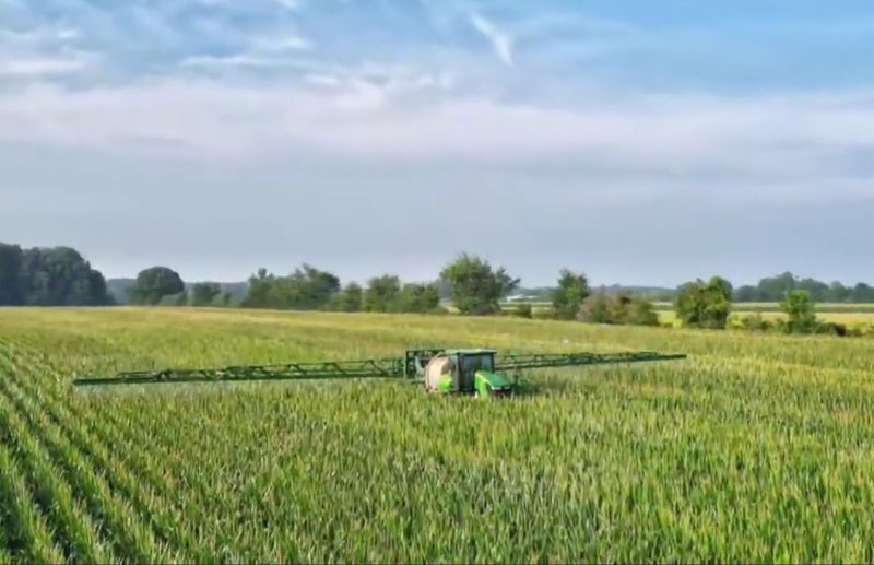 Setterington's sprayer working on crop
