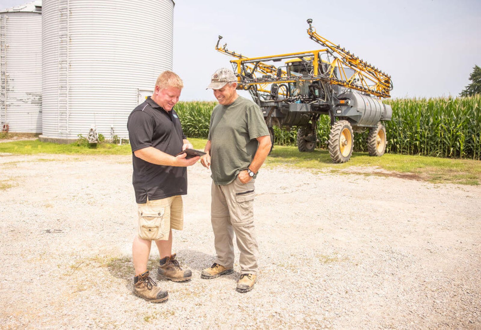 Setterington's employee working with farmer at Setterington's location